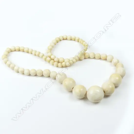 A vintage ivory bead necklace