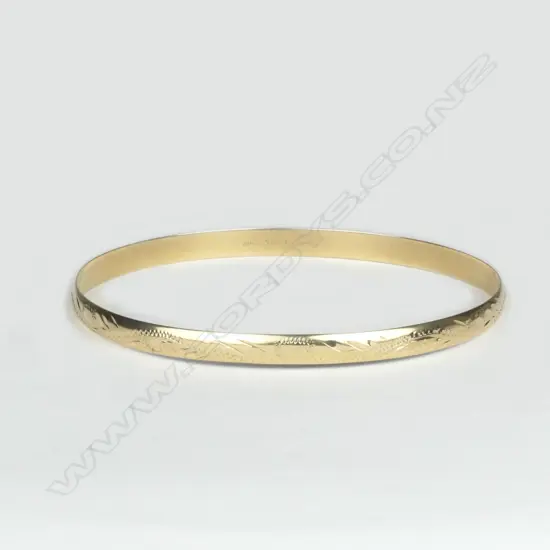 A 9ct. gold bangle