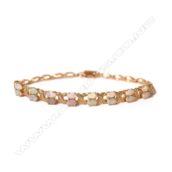 An 18ct. yellow gold opal and diamond bracelet