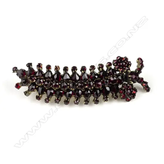 A vintage Bohemian garnet bug brooch