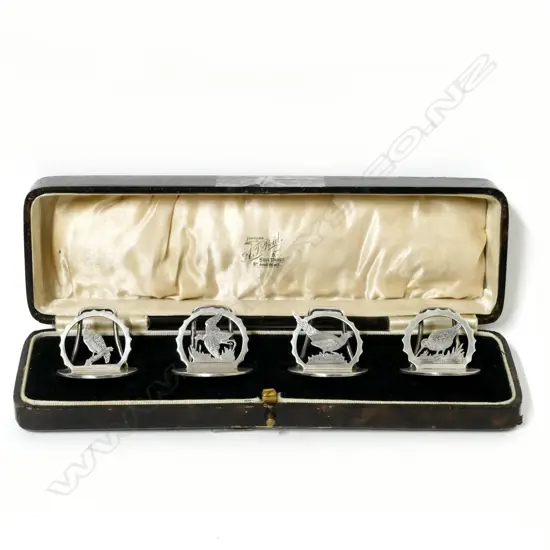 A cased set of silver place name holders