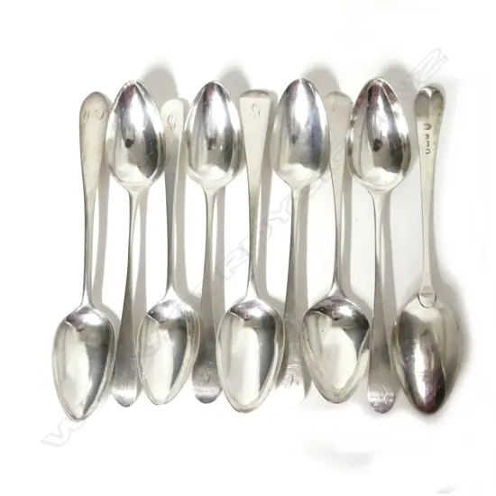 Nine Georgian silver dessert spoons