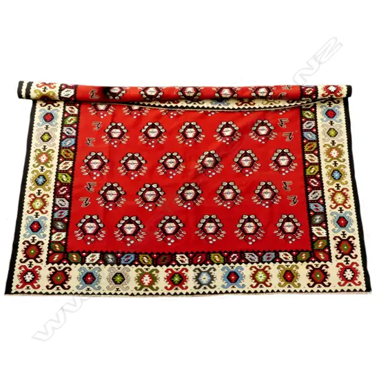 A Turkish hand woven kilim