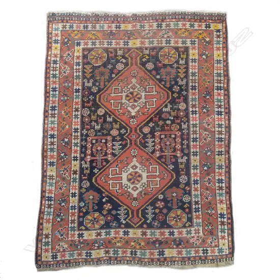 A hand knotted tribal all wool Shiraz rug