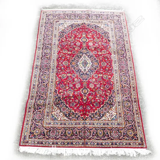 A large good quality hand knotted Persian Kashan rug