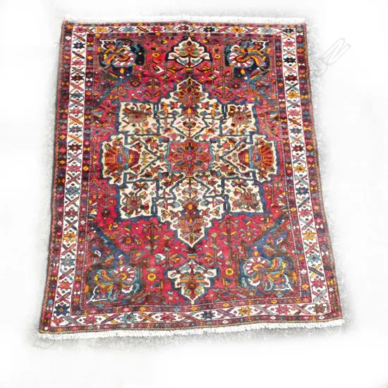 A hand knotted Hamadan carpet