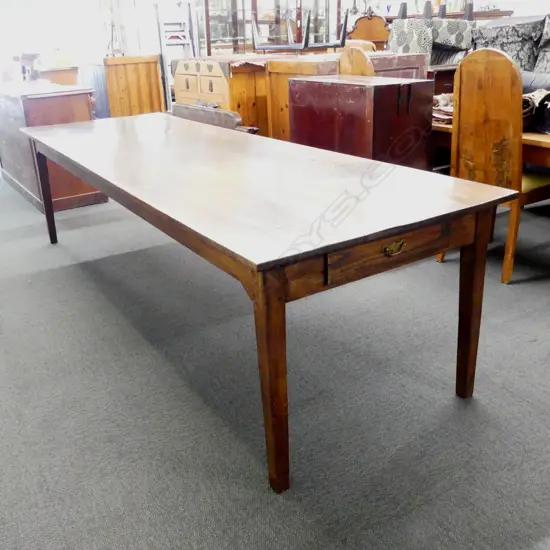 An oak French provincial country style dining table