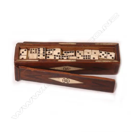 A 19thC/20thC Prisoner-of-War carved bone domino set in wood box