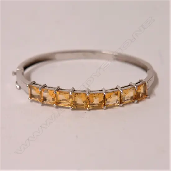 A multi-citrine and silver half-hinged bangle