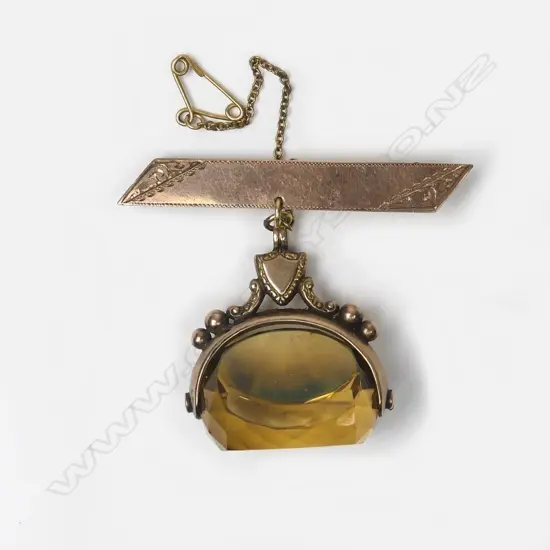 A 9ct rose gold and citrine spinner