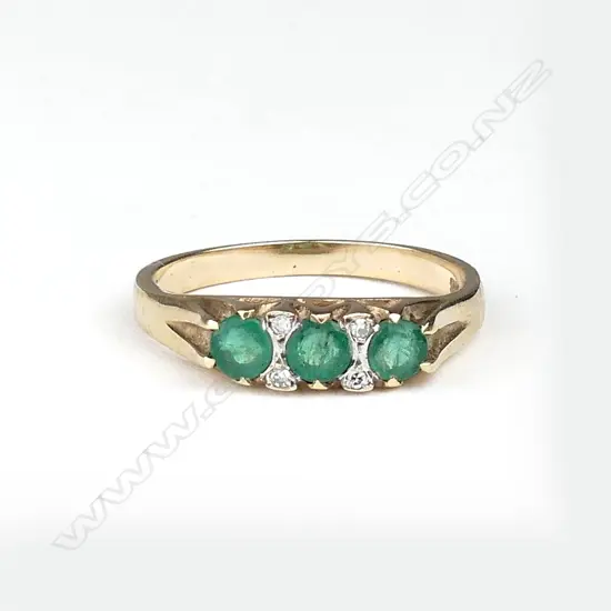A 9ct gold emerald and diamond ring