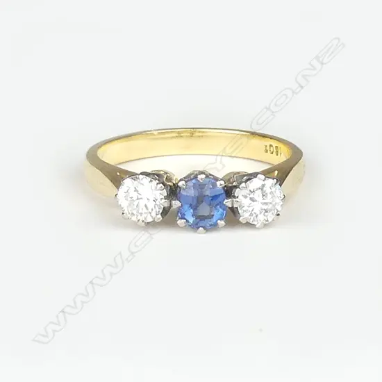 An 18ct gold sapphire and diamond ring