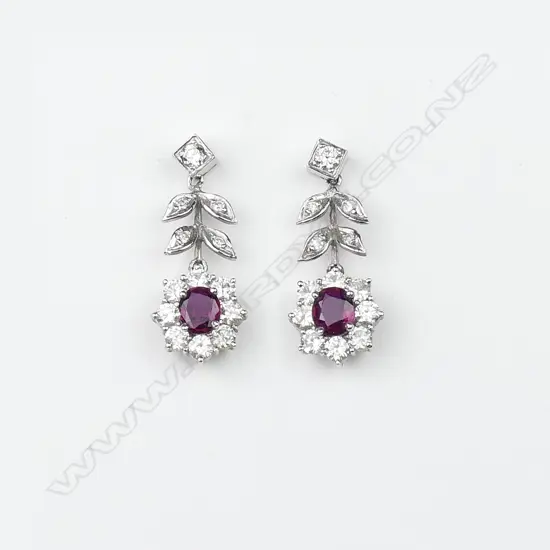 A pair of 18ct white gold diamond and ruby earrings