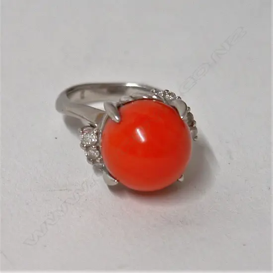 A platinum red coral and diamond lady's dress ring