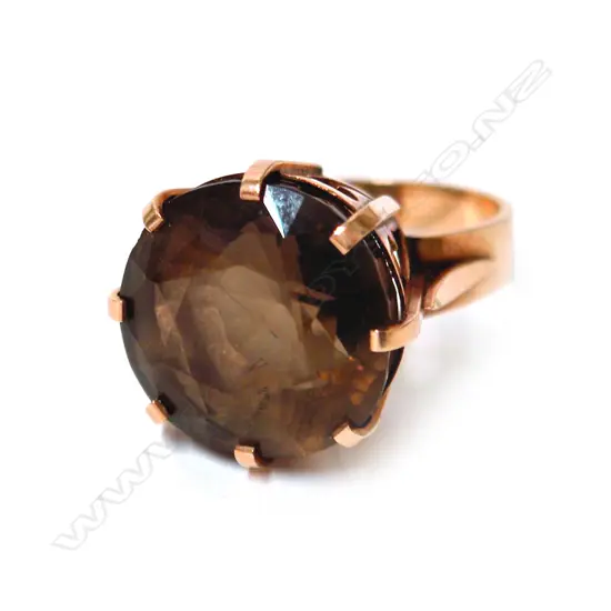 A 9ct. yellow gold and large topaz retro lady's dress ring