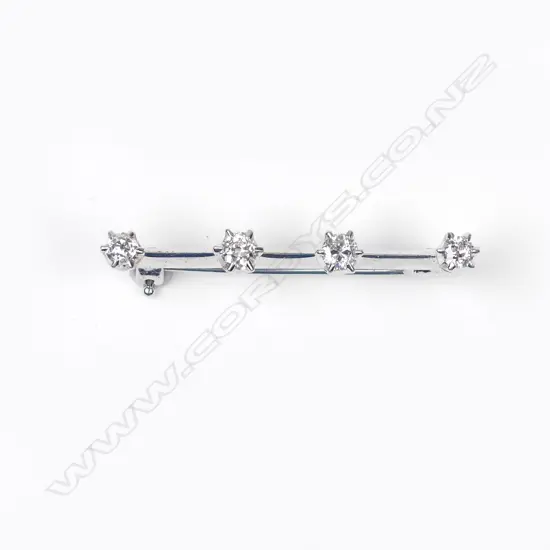 A platinum and diamond bar brooch