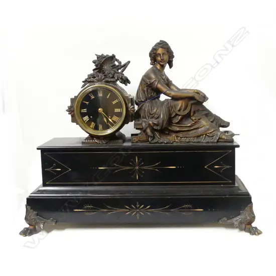 A French spelter bronze and marble mantel clock