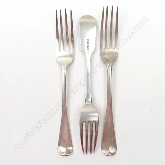 Three silver table forks