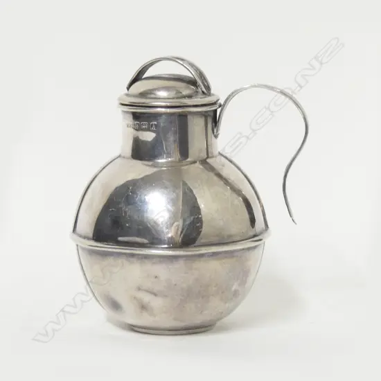 A silver Guernsey creamer