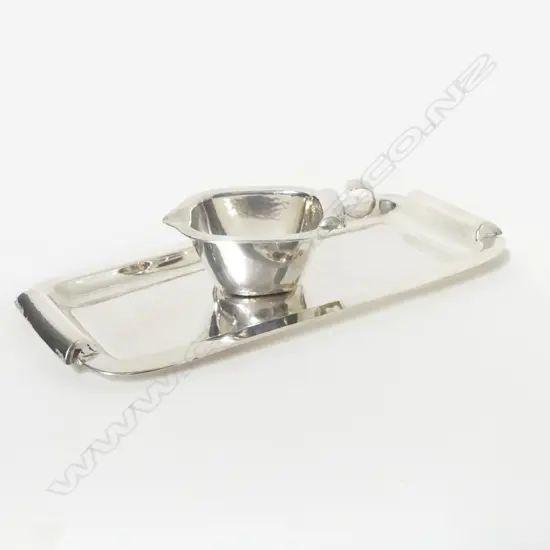 A German .830 silver oblong tray and conforming cream jug