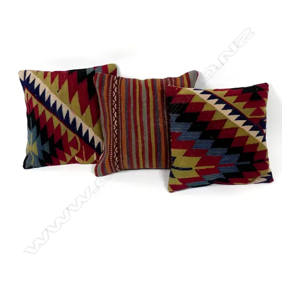 Three kilim cushions