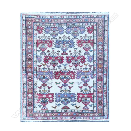A small Turkish hand knotted rug