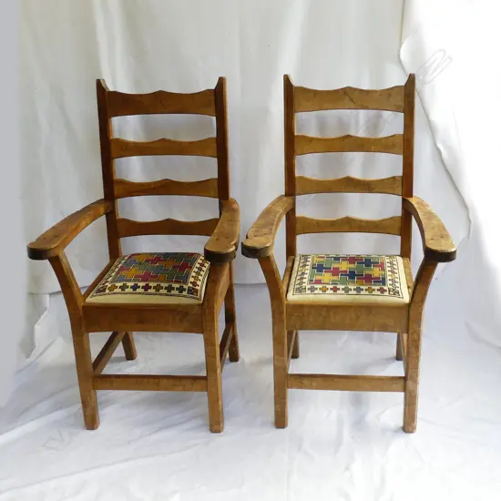 Two Chapman Taylor open elbow chairs