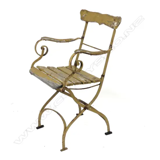 A vintage wrought iron and wood garden seat