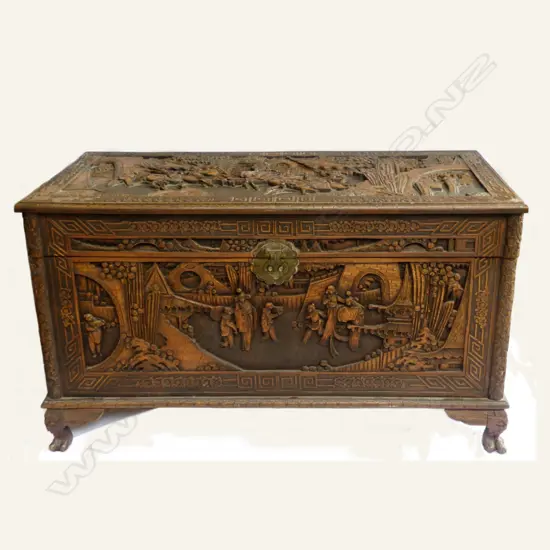 A carved Chinese camphor wood chest