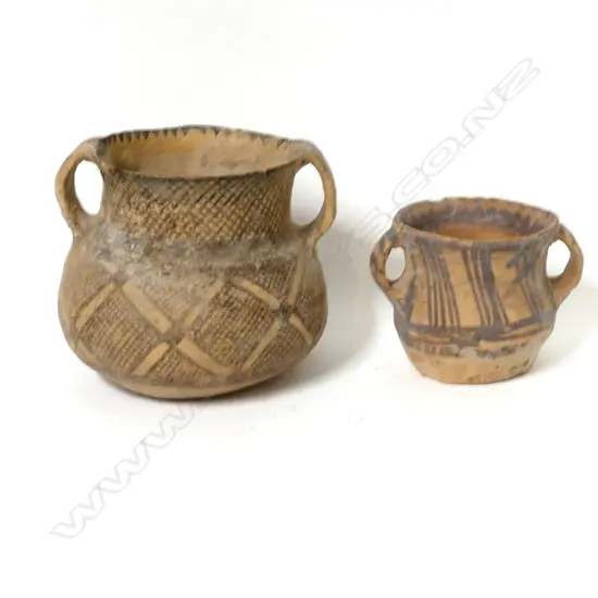 Two pre-Colombian style terracotta pots