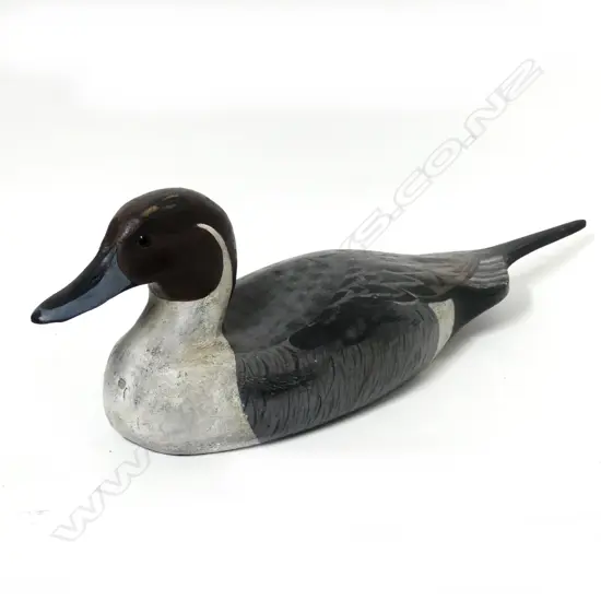A large Northern pintail carved wooden duck decoy