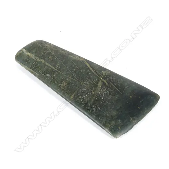 A wide flat nephrite adze blade