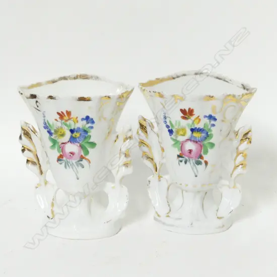 A pair of Victorian porcelain spill vases