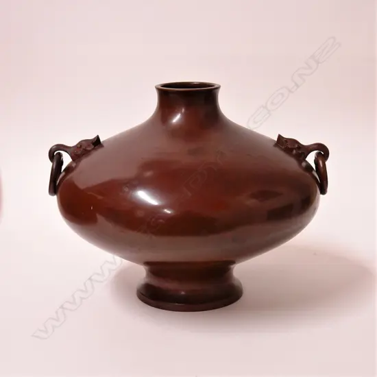 An Oriental bronze vase