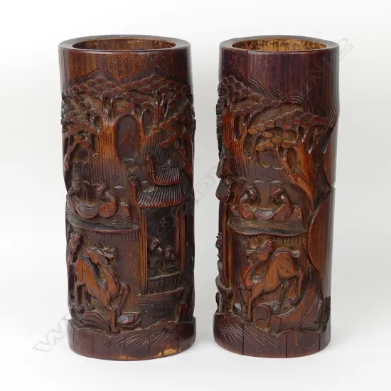A pair of vintage Chinese carved bamboo brush pots