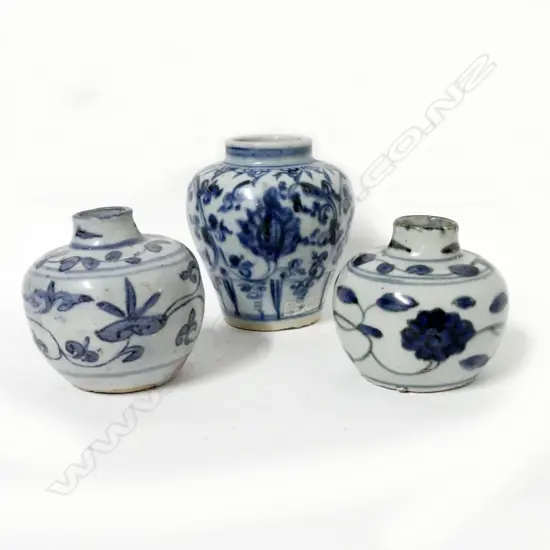 A small Ming provincial style blue and white vase and two jarlets