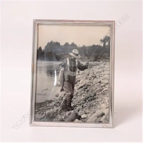 A silver rectangular photo frame