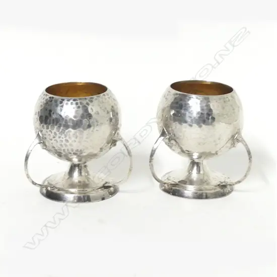 A pair of Arts & Crafts silver salts