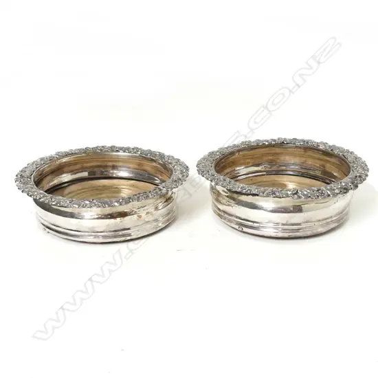 A pair of Old Sheffield Plate wine coasters