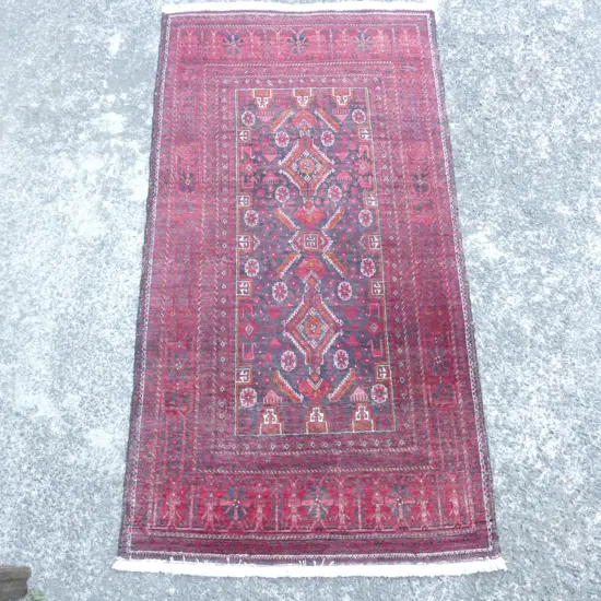 A Baluchi hand knotted carpet