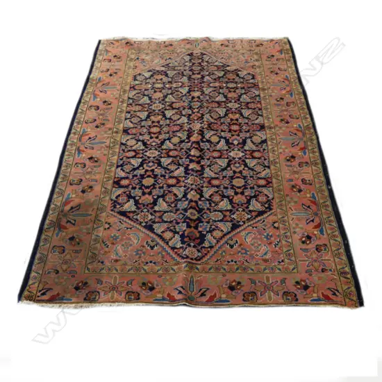 An antique Hamadan hand knotted rug