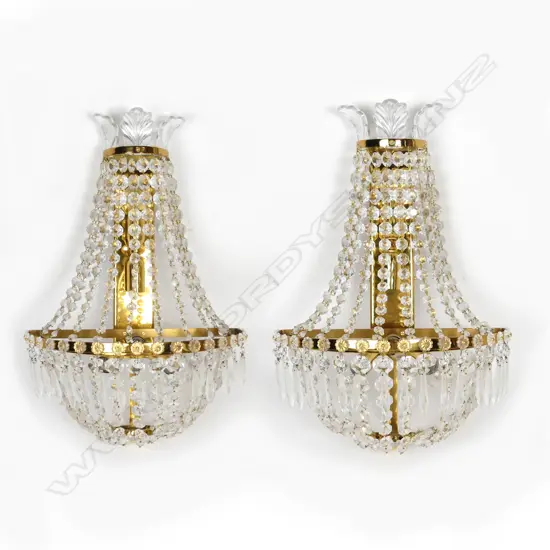 A pair of crystal waterfall light sconces