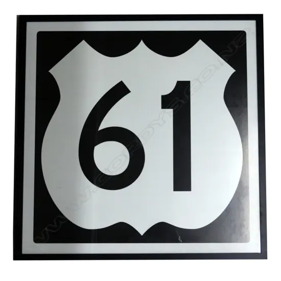 A framed print of Highway 61 road sign