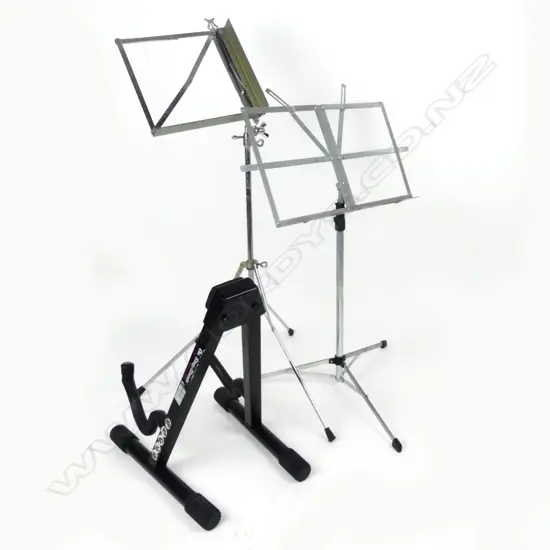 Two sheet music stands and a guitar stand
