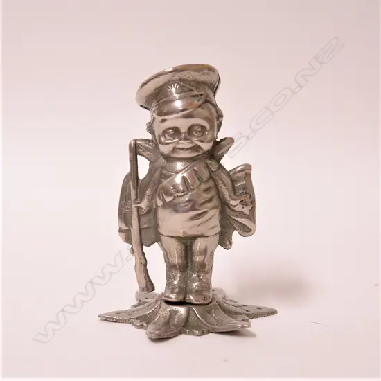 A rare vintage chromed metal Kewpie soldier
