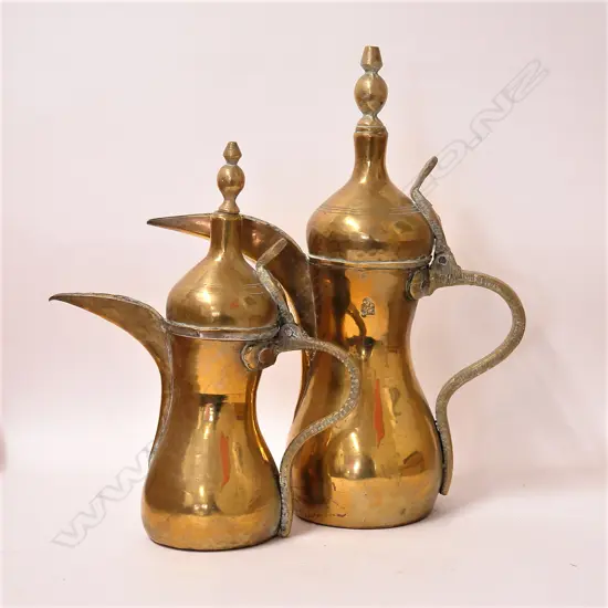 A pair of old Turkish graduated coffee pots
