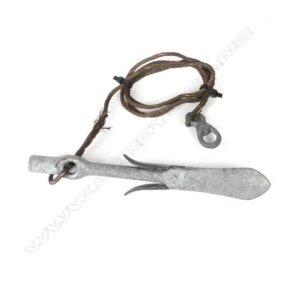 An aluminium porpoise head harpoon