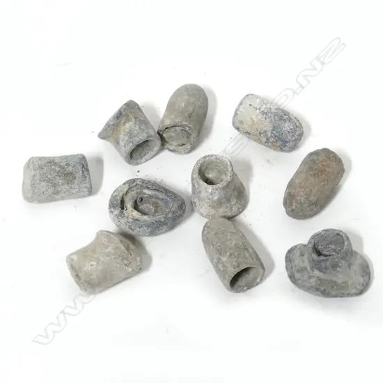 Ten lead musket projectiles