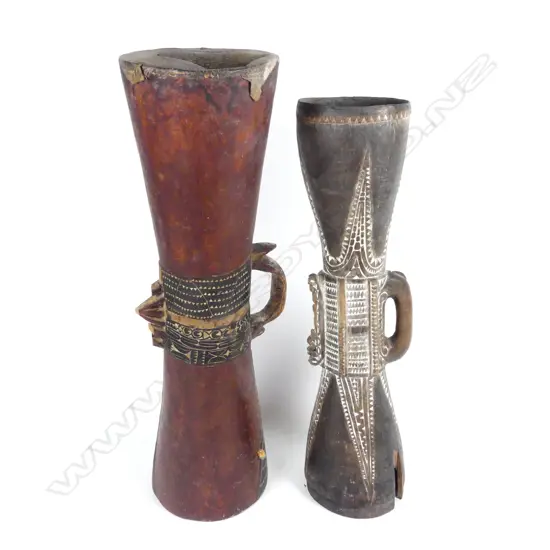 Two early New Guinea kundu drums