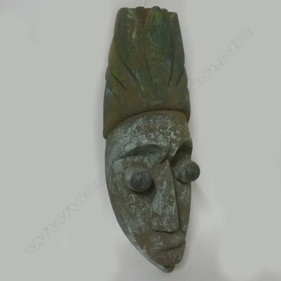 A carved wooden tribal mask
